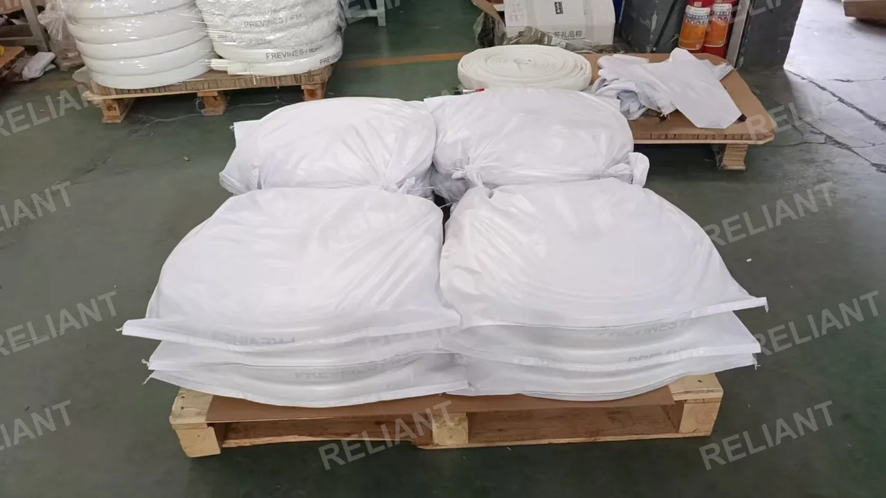 Wrapped hose coils on a pallet. Final packing depends on the order and handling requirements.